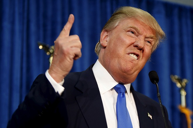 Republican presidential candidate Donald Trump gestures and declares "You're fired!" at a rally in Manchester, New Hampshire, June 17, 2015.  REUTERS/Dominick Reuter      TPX IMAGES OF THE DAY      - RTX1GZCO