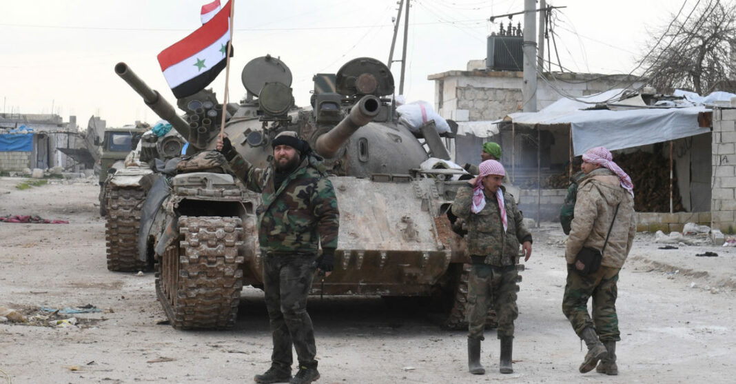 Syrian government forces deploy near the Damascus-Aleppo highway in the southern part of Syria's northern Aleppo province on February 10, 2020. - Syrian regime artillery killed five Turkish soldiers in Idlib today, Turkey's defence ministry said, as the number of people displaced by violence in the region neared 700,000 since December. (Photo by - / AFP) (Photo by -/AFP via Getty Images)