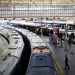 FILE PHOTO: A view of trains on the platform at Waterloo Station as a station worker stands nearby, on the first day of national rail strike in London, Britain, June 21, 2022. REUTERS/Henry Nicholls//File Photo