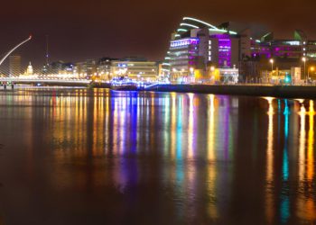 View of Liffey river at night in Dublin, Ireland