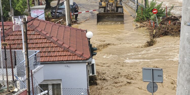 The aftermath of the fierce rainstorms hit central Greece showing the damage from the floods while roads are still covered by floodwater and mud and heavy machinery and bulldozers are cleaning the area, while fire service is pumping water. The city of Volos witnessed flooded and mud-covered cars and other vehicles still in the water on the morning of 7 September 2023, after being hit by Storm Daniel and record rainfall causing deadly flash floods.  Casualties have been reported in addition to missing people while cities, villages and areas are without running water and electricity. In Pelion mountain region, Volos city and Skiathos island restriction in traffic was imposed. Volos, Greece on September 7, 2023 (Photo by Nicolas Economou/NurPhoto) (Photo by Nicolas Economou / NurPhoto / NurPhoto via AFP)